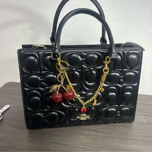Coach Black Embossed Satchel with Gold Chain and Cherry Charm